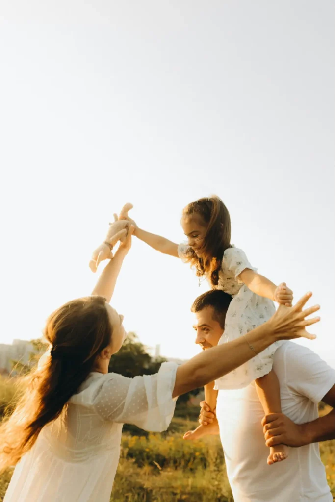A family celebrating that they finally have a house that can become home where they can grow, grieve, heal, and delight in life together.