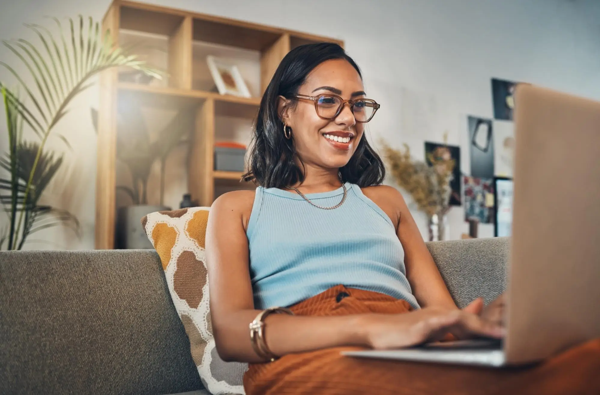 The woman on the computer represents the increase in buyers using the internet to search for homes before contacting a realtor.
