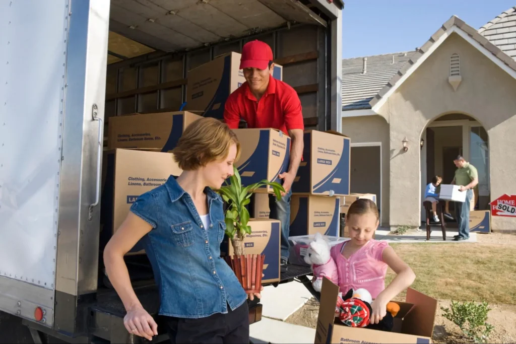 This family helping the movers shows that you can leave it to movers, do it yourself, or help the movers.
